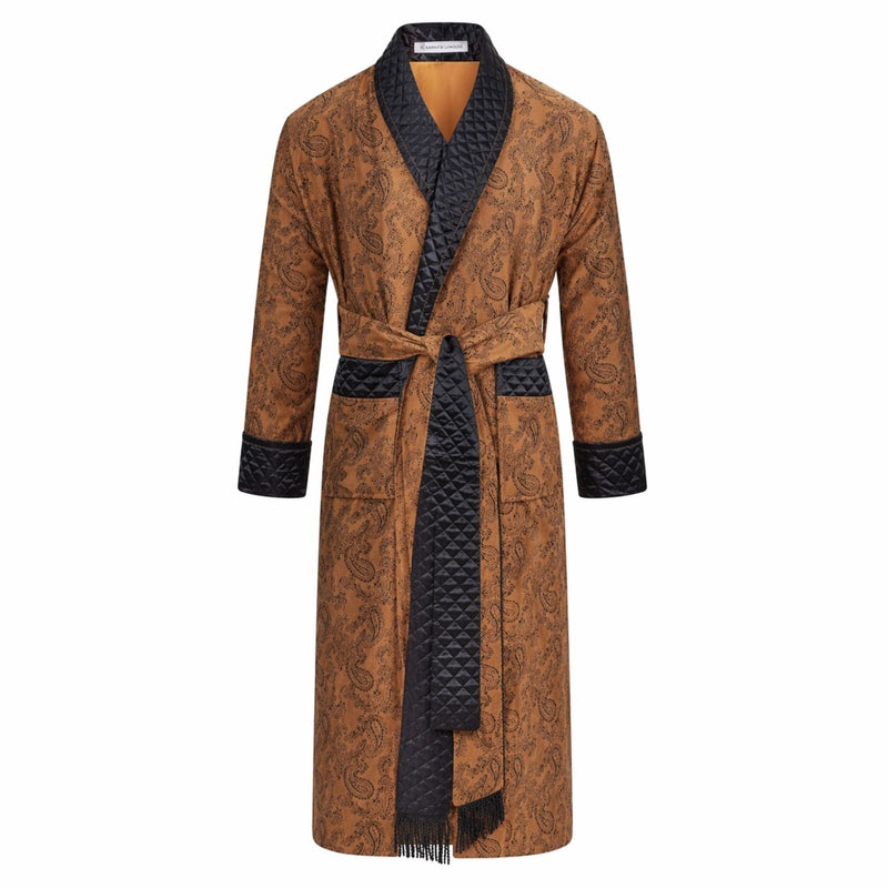 Gold patterned robe with black accents on a white background