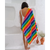 Bring some brightness to the beach with our Multicolour Rainbow beach towel. Made from 100% organic cotton, it's not only soft and absorbent, but also eco-friendly.